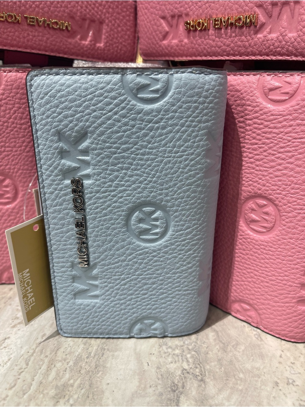 Michael Kors Embossed Logo Trifold Wallet - Light Blue